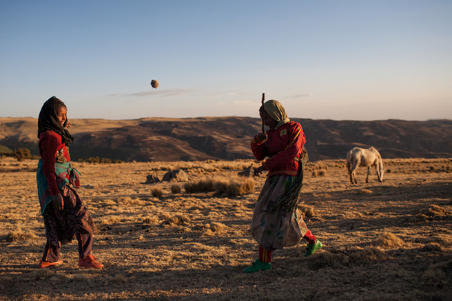 Friends Play a Game Outside Gich Village