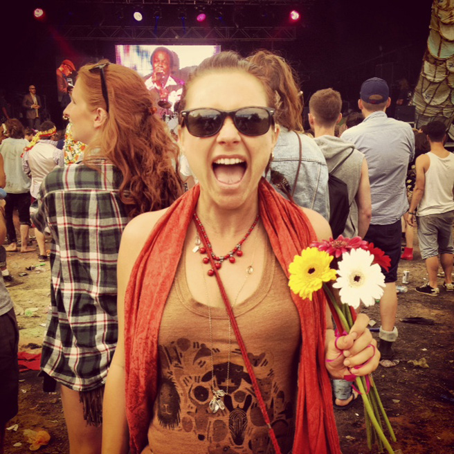 Singer January Thompson wearing an AWF ThreadStart tank at the Secret Garden Party Festival 