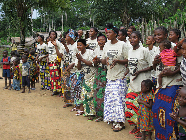 A crowd welcoming AWF’s inaugural voyage to the Lomako Conservation Science Centre