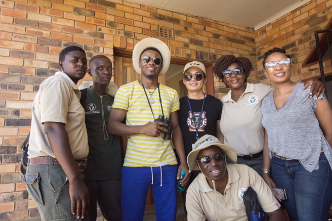 Alikiba with Chinese film star Wang Baoqiang and conservationists in South Africa