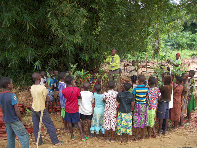 Teacher and students at Ilima School in Democratic Republic of Congo