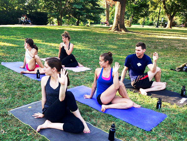 Yoga teacher and AWF employee Amy Rizzotto leads an outdoor class to raise funds for Africa Yoga Project