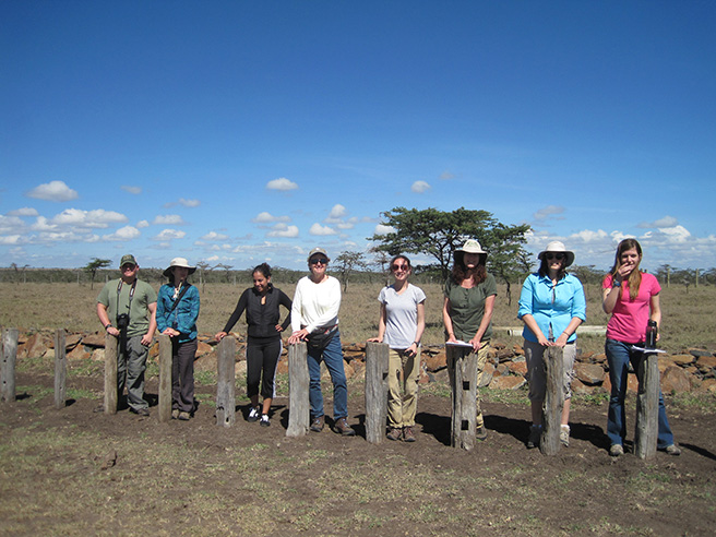 Students from George Mason University&#039;s Kenya Ecology and Conservation course, standing with rhino blocks, in Sweetwaters Camp. Photo by: Leslie Funk 
