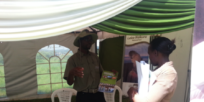 African Wildlife Foundation CMTP, George Okwaro, answering a question from an interested attendee at World Migratory Bird Day 2013