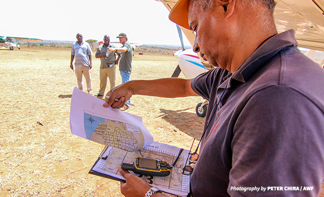 Reviewing the flight plan during the aerial census