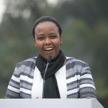 A woman giving a speech