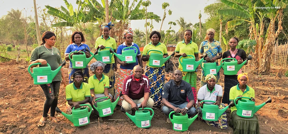 Photo of AWF-supported farmers receiving watering cans for dry season