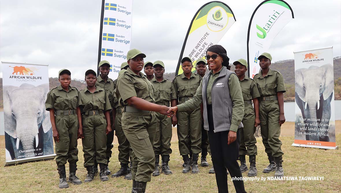 AWF Zimbabwe Country Director Olivia Mufute (right) congratulated the newly-graduated scouts