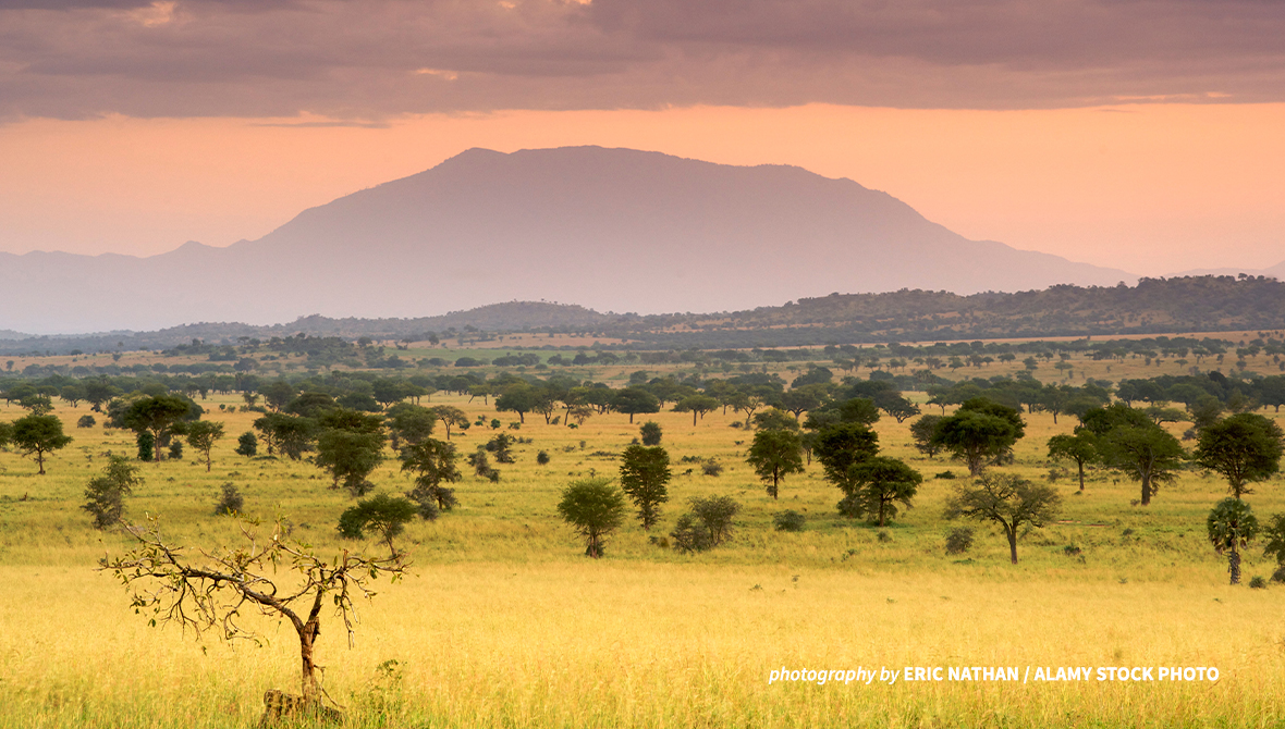Dawn breaks behind a mountain in Kidepo Valley National Park.