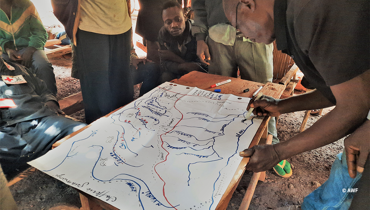 People looking at a map.