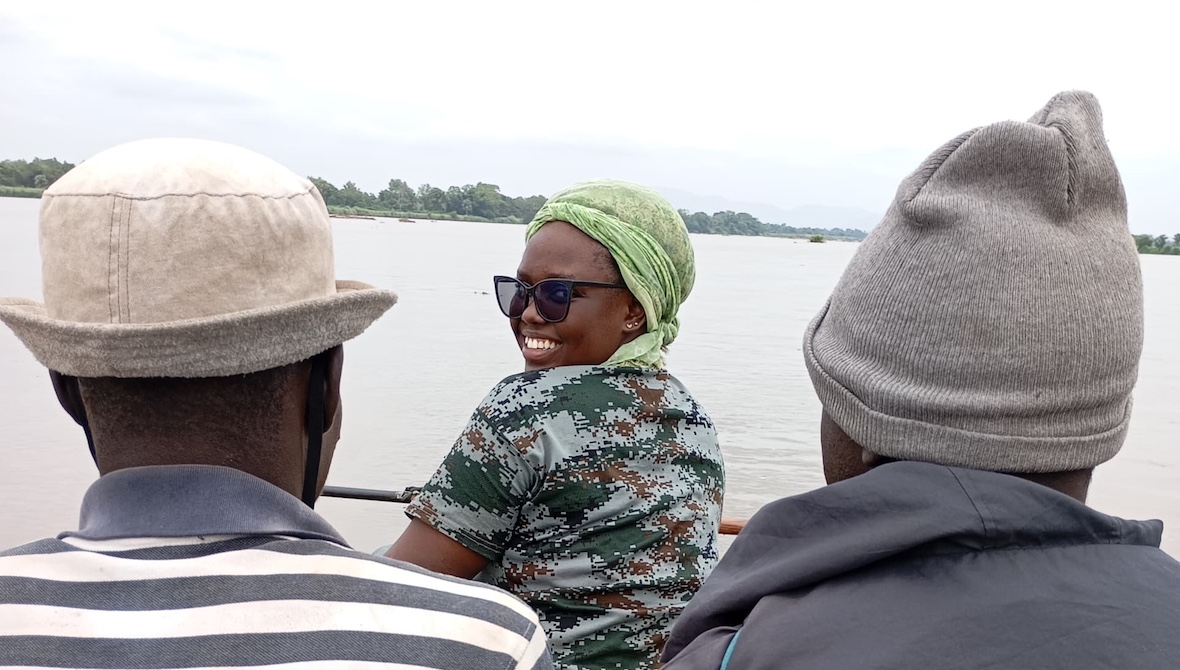 Maeva crossing river Faro to go collect data for her first time..jpeg