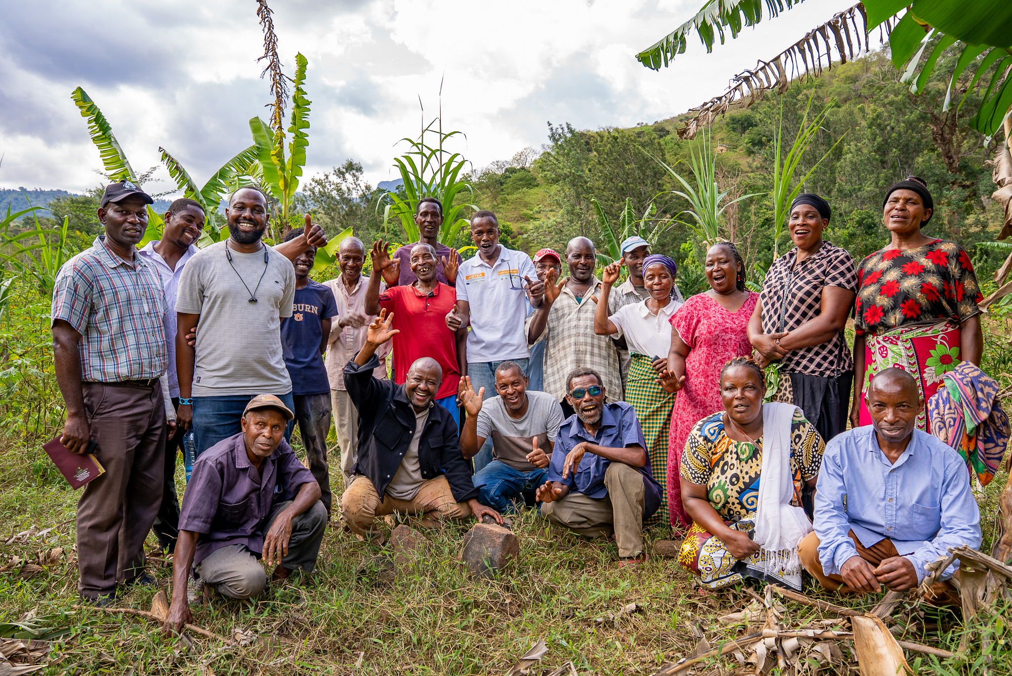 Chief Simon Mwakio (far left) with community members engaged in restoration efforts across Bura