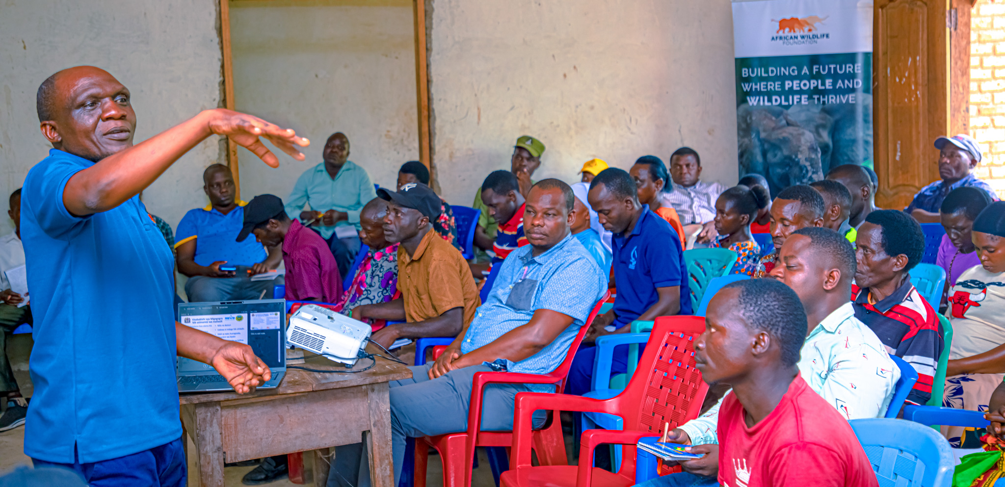 AWF Tanzania Agriculture Officer Alexander Mpwaga leads a community validation and training session in Tanzania’s Kilombero Landscape,