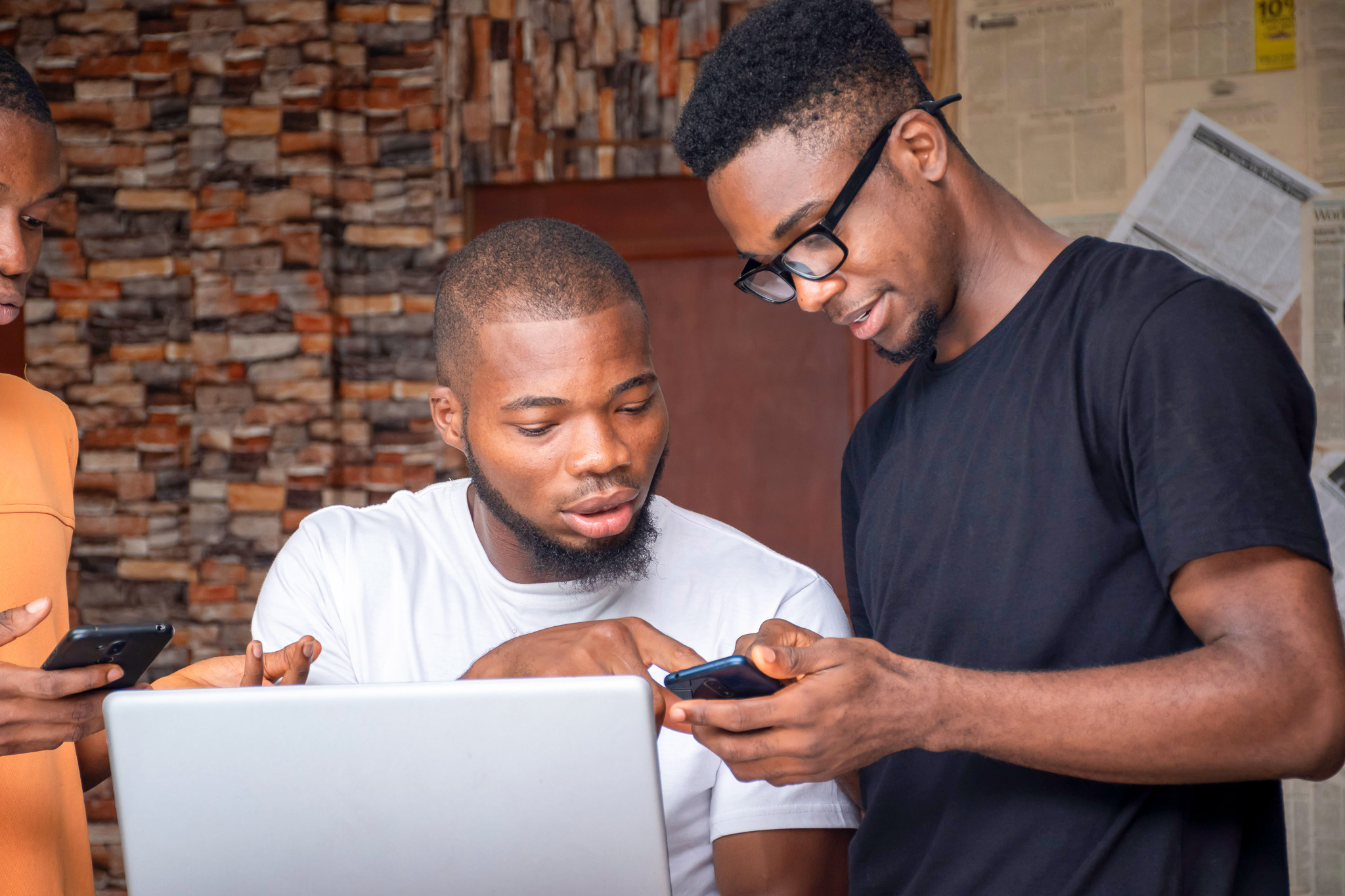 African youth using technology.