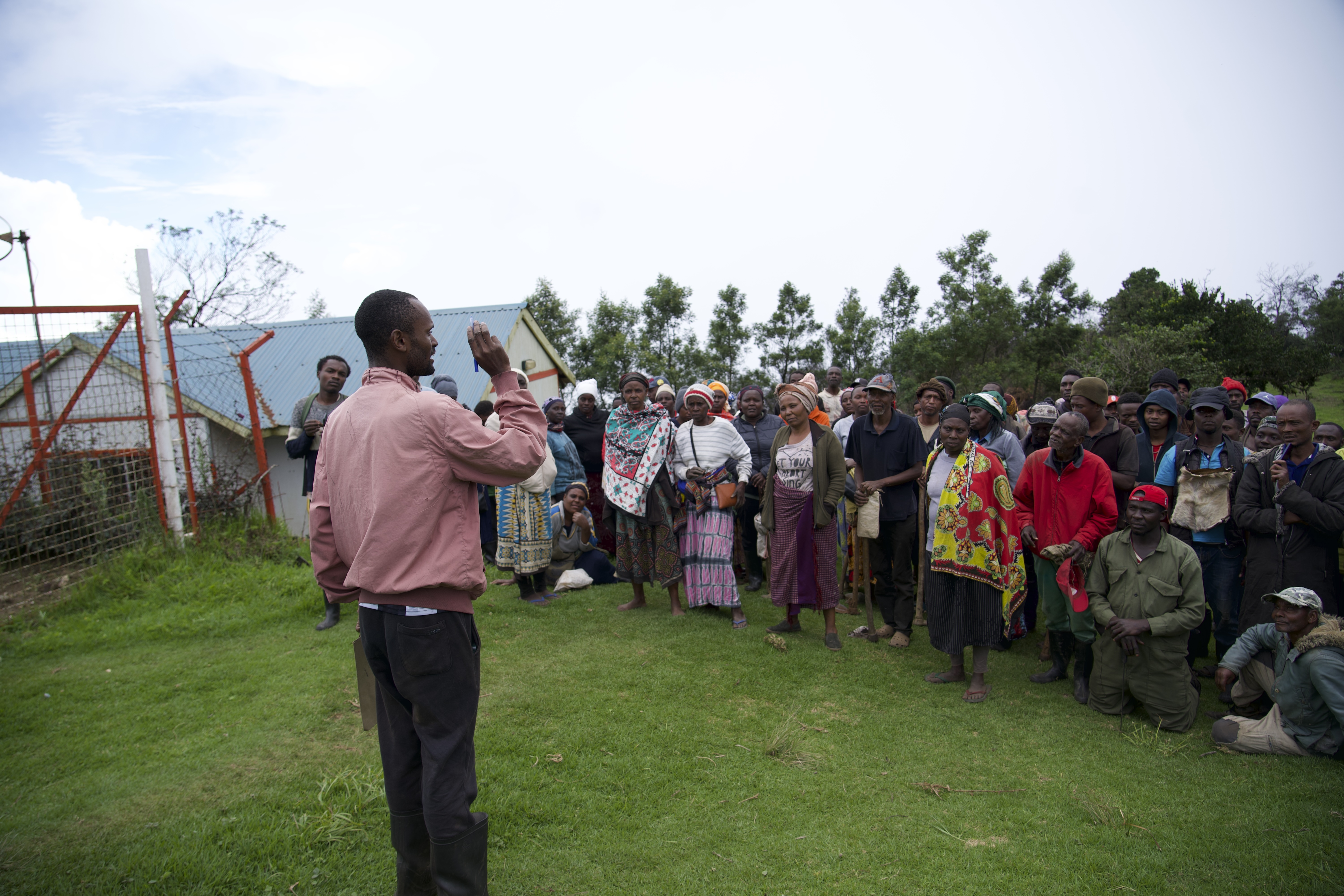 Ernest Maghanga speaking with Vuria CFA members following a successful forest restoration exercise. 