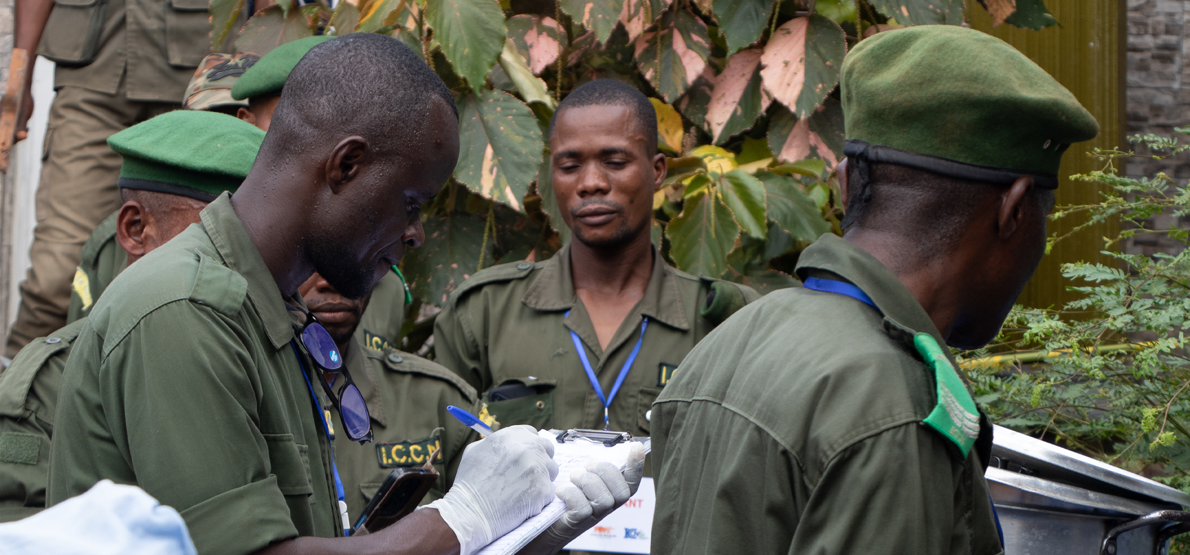 An ICCN eco-guard takes detail notes, documenting evidence.