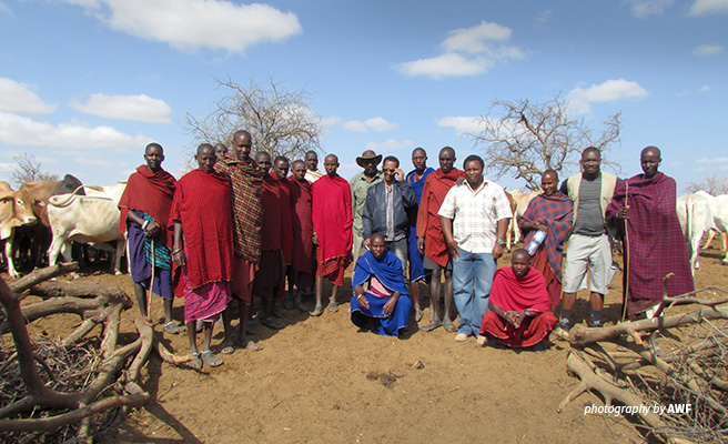 Photo of Edwin Tambara with community members in Tanzania during conservation management training