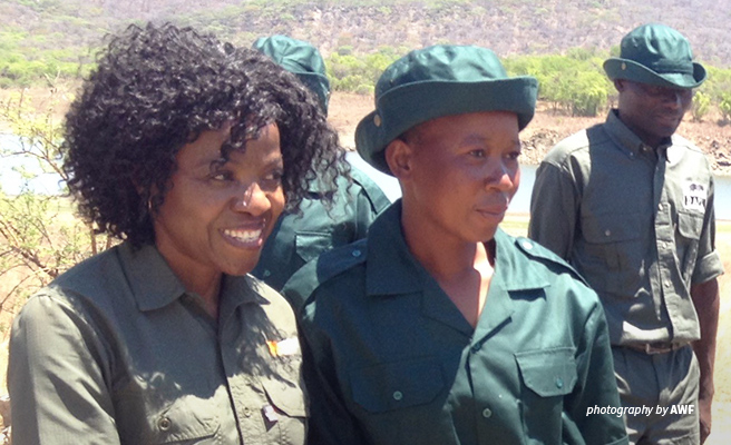 Olivia Mufute and graduating community wildlife scout from Mbire, Zimbabwe