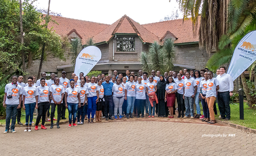 Photo of participants standing outside AWF HQ at AWF Youth Forum