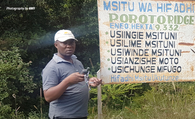 Photo of African Wildlife Foundation Hydrologist Damas Patrick Mbaga at forest reserve in Southern Tanzania Photo of African Wildlife Foundation Hydrologist Damas Patrick Mbaga at forest reserve in Southern Tanzania
