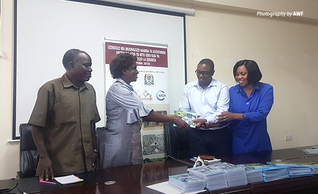 Photo of officials from African Wildlife Foundation, the University of Dar es Salaam, Tanzania Ministry of Water, and Rufiji Basin Water Board at launch of TARRISfupi Photo of officials from African Wildlife Foundation, the University of Dar es Salaam, Tanzania Ministry of Water, and Rufiji Basin Water Board at launch of TARRISfupi