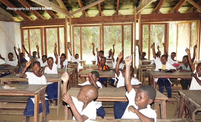 Photo of primary school children in classroom at Ilima Conservation School