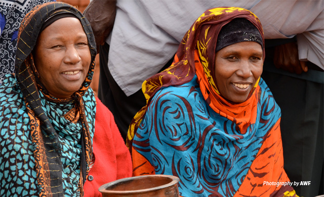 Photo of two women from rural Tanzania invovled in AWF conservation project Photo of two women from rural Tanzania invovled in AWF conservation project