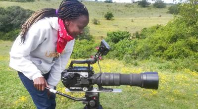 Wildlife filmmaker Fiona Tande shooting in the field