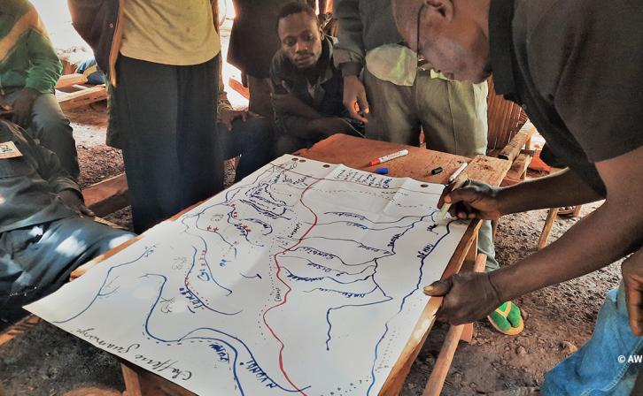 People looking at a map.