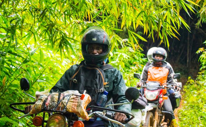 Jeancy Luaka - Motorcycle Rider navigates through the dense Lomako-Yokokala Faunal Reserve