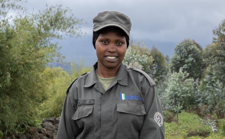 Meet Umuhoza Aline, a Community Eco-Guard serving in Rwanda’s Volcanoes landscape.