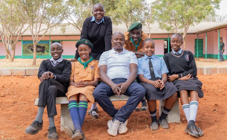 Teacher and Wildlife Club Patron Patrick Kiminza with some of his students at Ngwata Comprehensive School in Makueni County, Kenya. © AWF