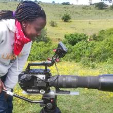 Wildlife filmmaker Fiona Tande shooting in the field