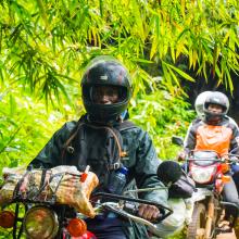 Jeancy Luaka - Motorcycle Rider navigates through the dense Lomako-Yokokala Faunal Reserve
