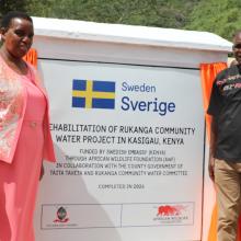 H.E. Christine Saru Kilalo, Deputy Governor of Taita-Taveta County, together with Martin Muriithi of the Embassy of Sweden, officiates the commissioning of the Rukanga Community Water Project.