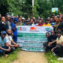Participants of the Biodiversity Monitoring Training pose for a group photo at Tiwai Island Wildlife Sanctuary, Sierra Leone. The training brought together 40 participants to build capacity in biodiversity monitoring techniques within one of West Africa's most significant remaining tracts of lowland rainforest.