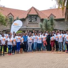 Photo of participants standing outside AWF HQ at AWF Youth Forum