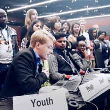 Photo of Global Youth Biodiversity Network at delivering closing remarks at the Convention for Biological Diversity Conference