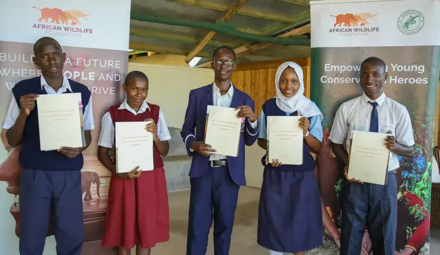 The Recipients of the 2025 AWF Young Conservation Heroes Scholarship from the left to right: Robert Kilapai, Zipporah Mumo Kiminza, Abdulrahym Godhana Garise, Swabrina Esmael, Mwamtutu Hamisi Mwaiwe.