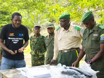 AWF Senior Social Safeguard Officer, Dodo Moke during a presentation