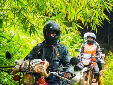 Jeancy Luaka - Motorcycle Rider navigates through the dense Lomako-Yokokala Faunal Reserve