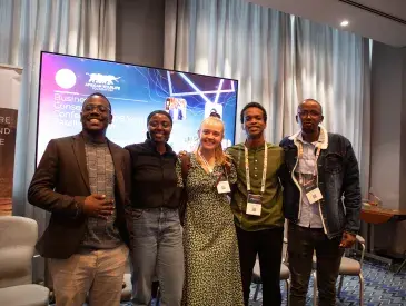 Stanely Kadeghe alongside fellow youth panelists at the Business of Conservation Conference.