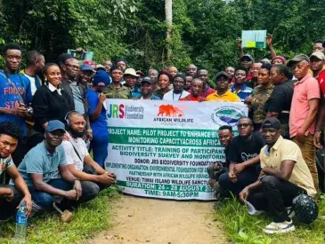Participants of the Biodiversity Monitoring Training pose for a group photo at Tiwai Island Wildlife Sanctuary, Sierra Leone. The training brought together 40 participants to build capacity in biodiversity monitoring techniques within one of West Africa's most significant remaining tracts of lowland rainforest.