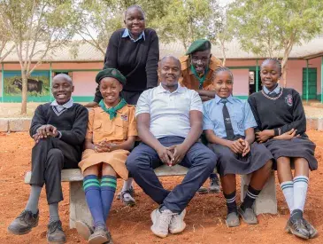 Teacher and Wildlife Club Patron Patrick Kiminza with some of his students at Ngwata Comprehensive School in Makueni County, Kenya. © AWF
