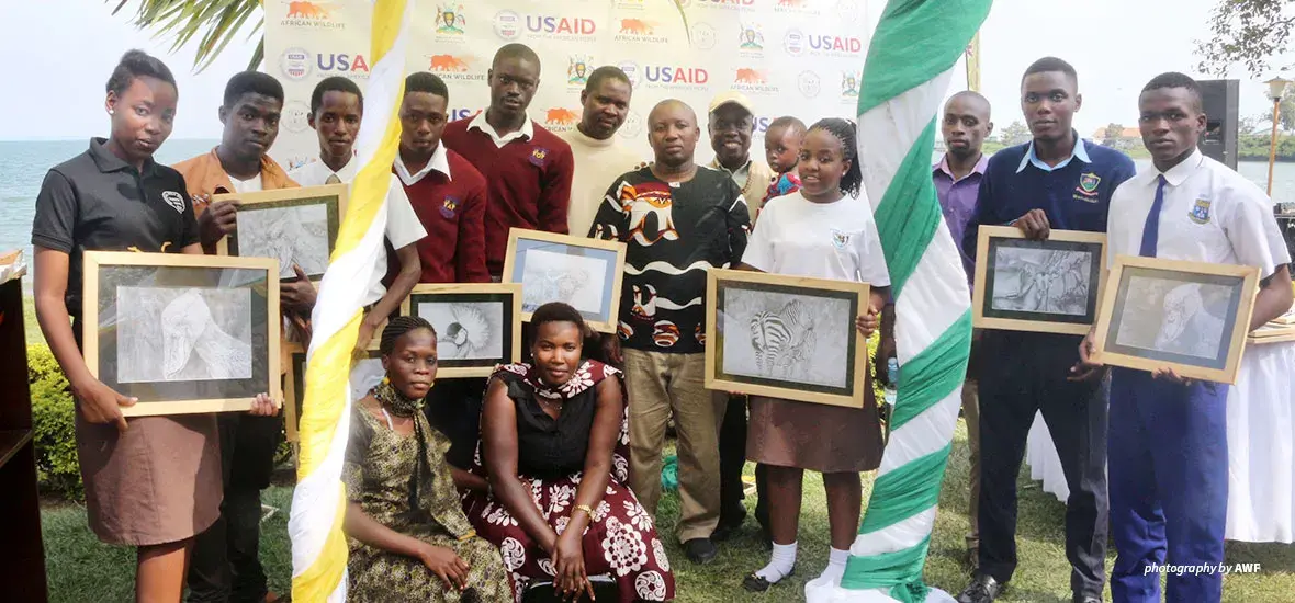 Photo of youth artists and their teachers in Uganda