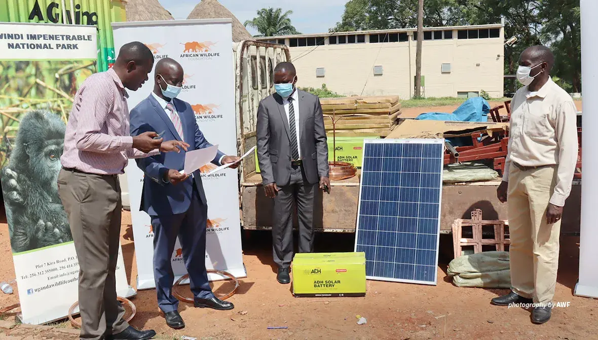 Photo of AWF and UWA representatives at solar equipment handover