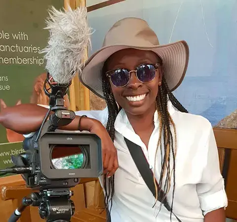 Wildlife filmmaker Fiona Tande with camera