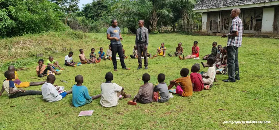 Christian Tshibasu conducting an environmental education session with Ilima School students on Nature Conservation Day 2021.